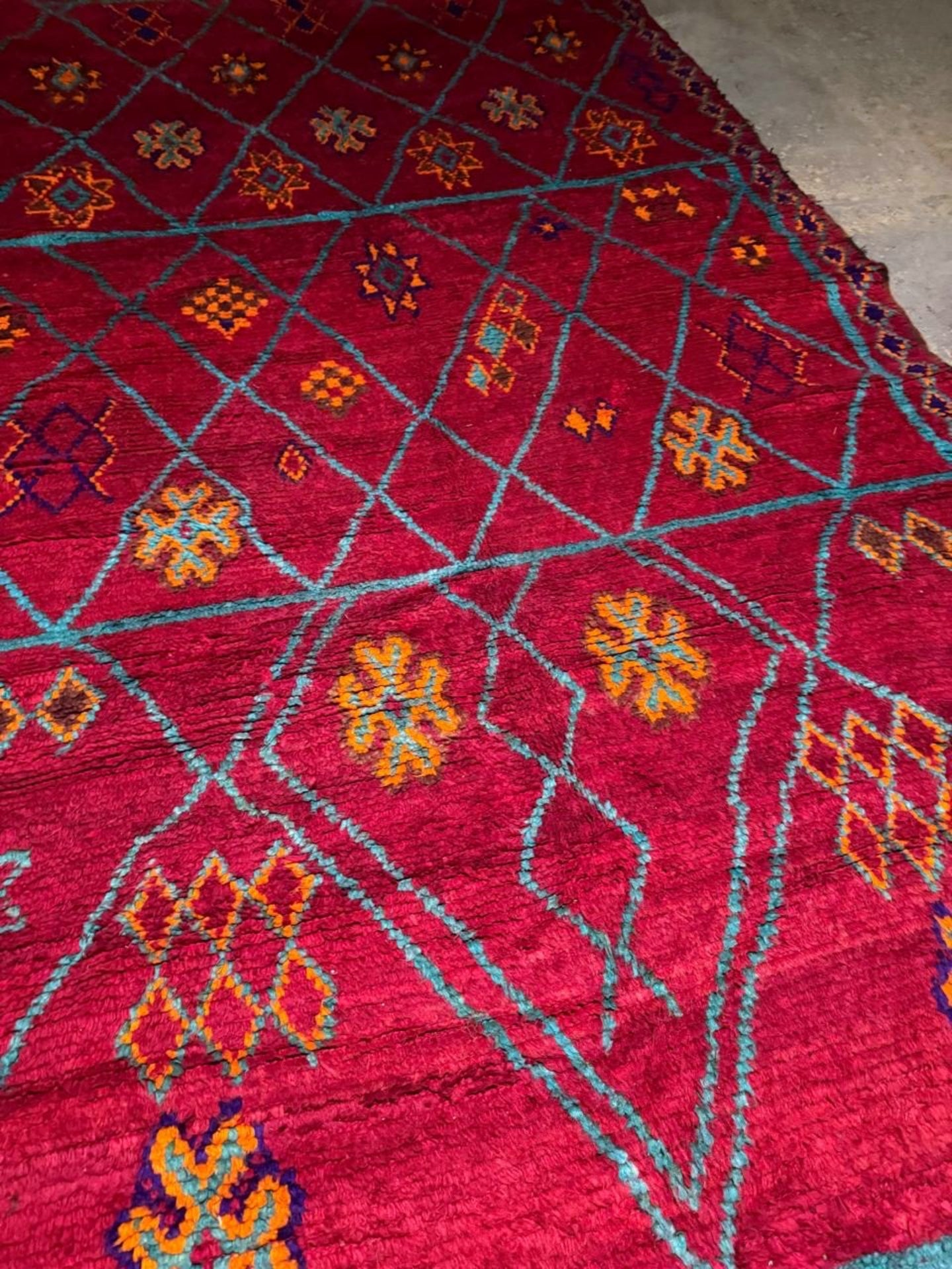 Close-up of diamond forms with internal tribal symbols

