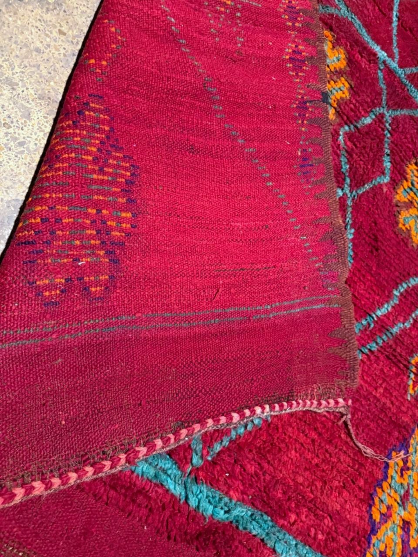 Detailed view of yellow and orange geometric accents

