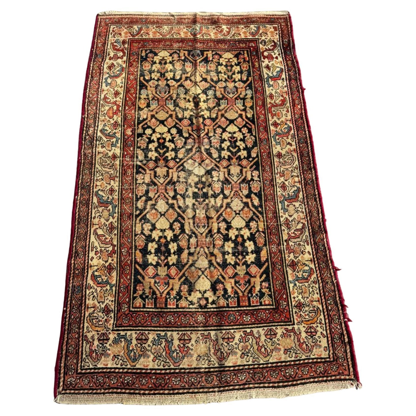 Antique Hamadan runner rug with geometric floral motifs

