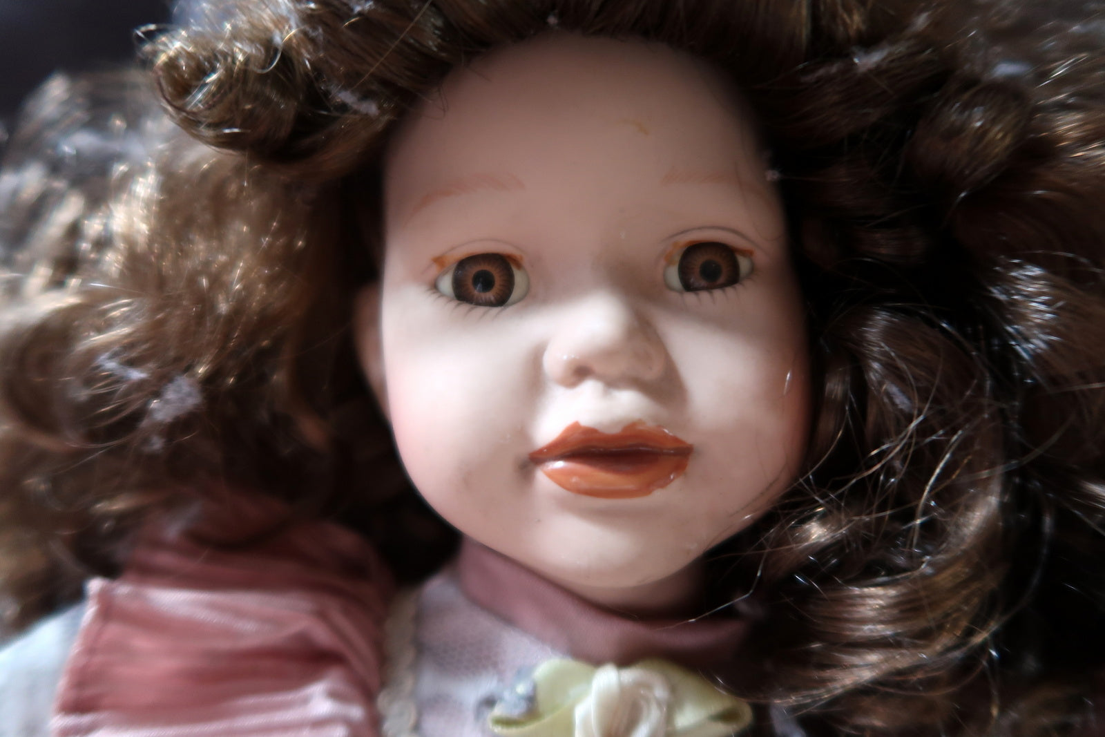Graceful vintage porcelain doll in good condition
