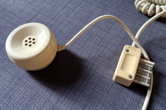 Retro beige phone with push-button dialing
