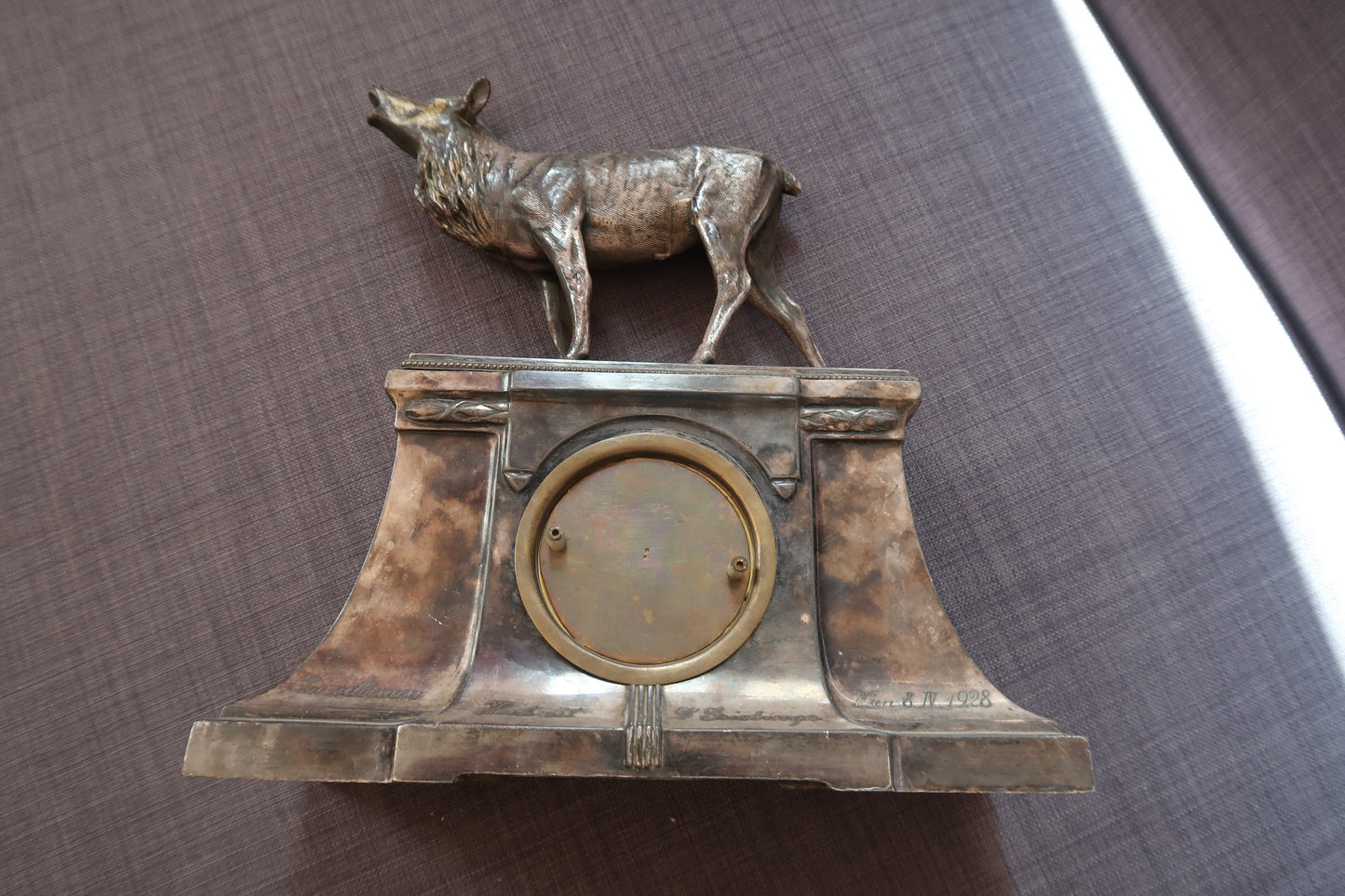 Shot focusing on the deer's powerful legs and hoof details

