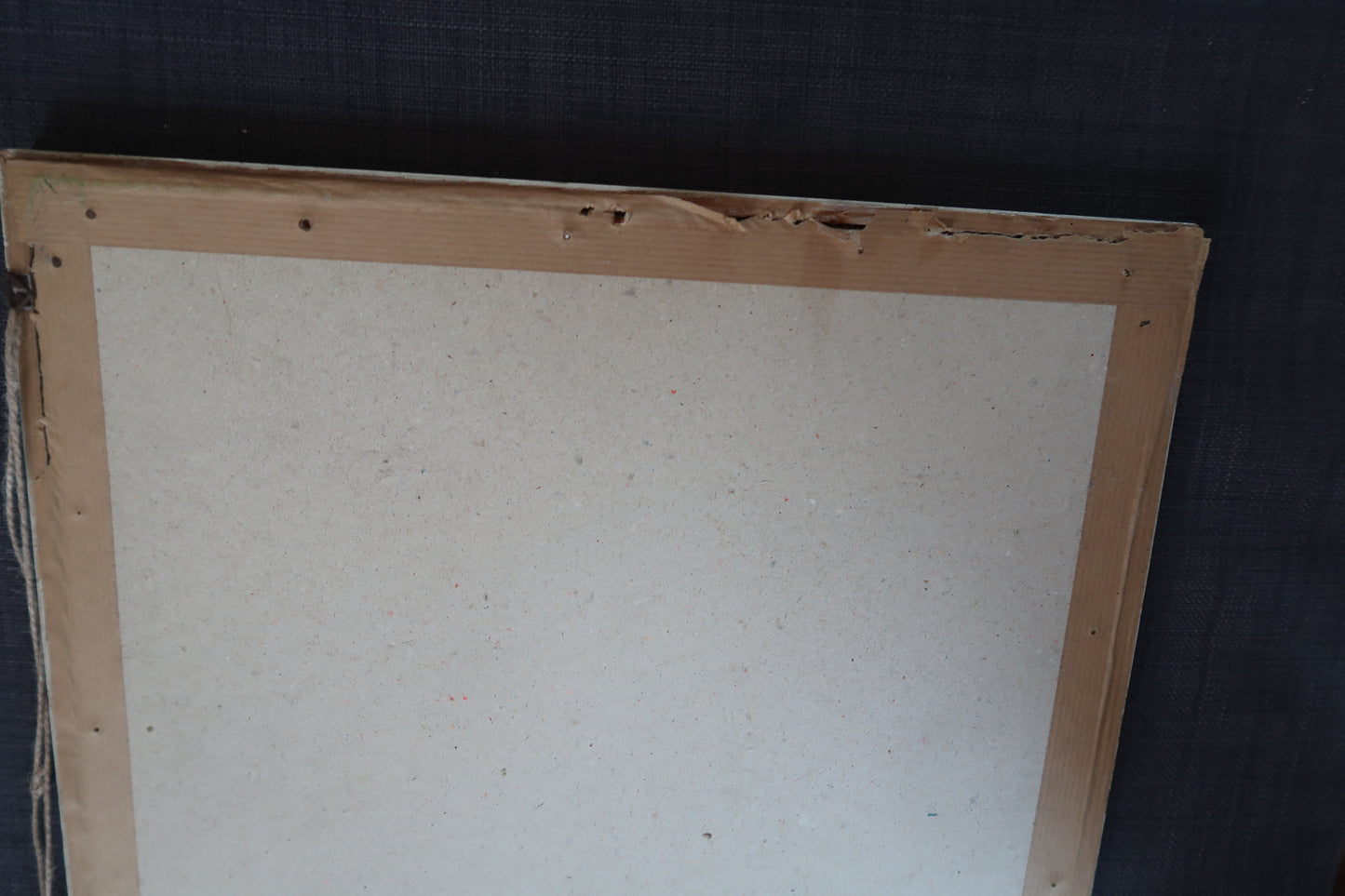 Three-quarter angle view of entire framed artwork

