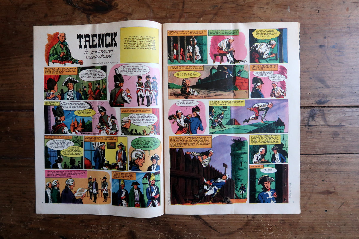 Detailed close-up of 1958 Journal de Tintin issue number 513 and Dargaud Paris publishing banner