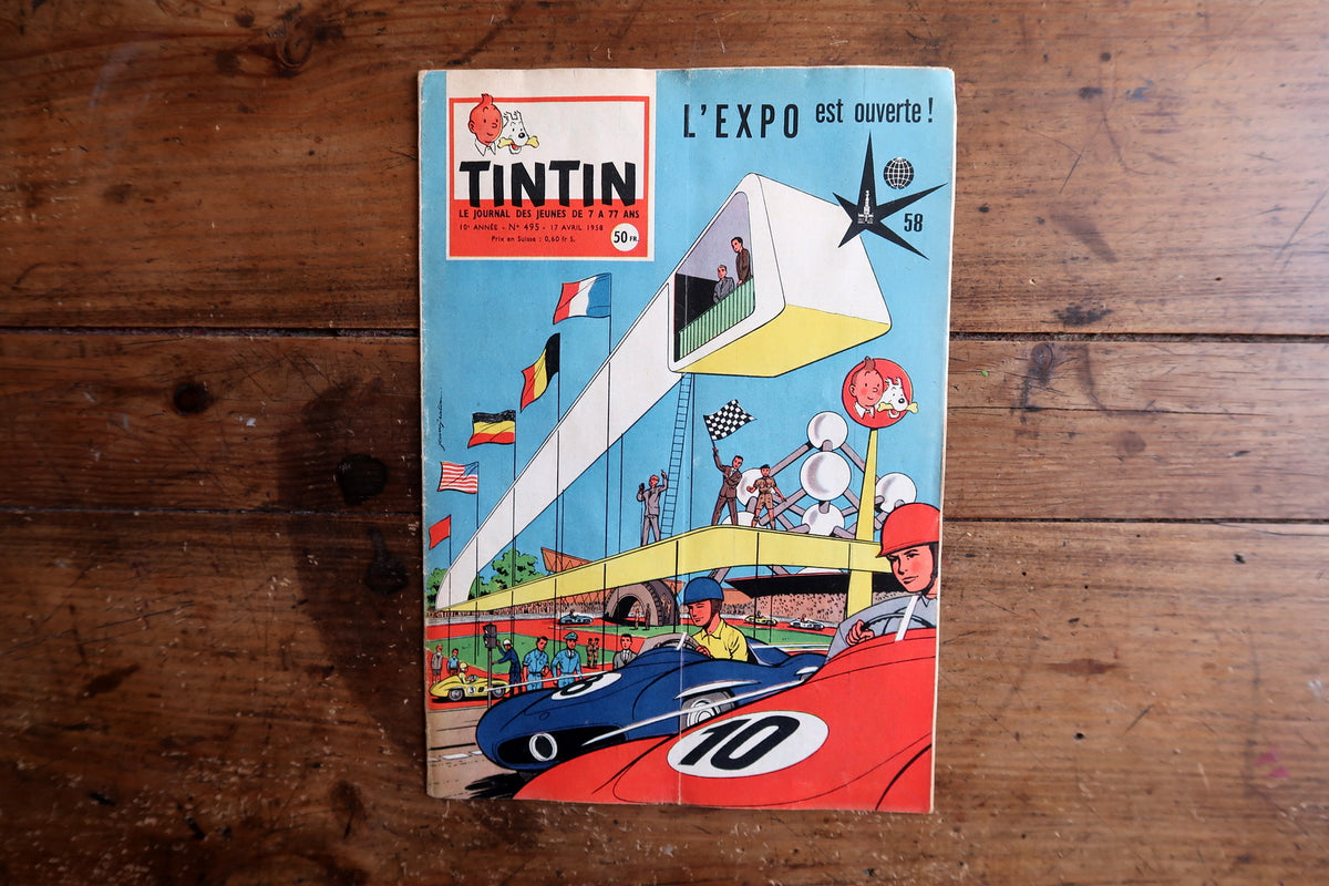 Collectible vintage April 1958 Tintin magazine cover with vibrant mid-century color printing and classic European comic illustration.