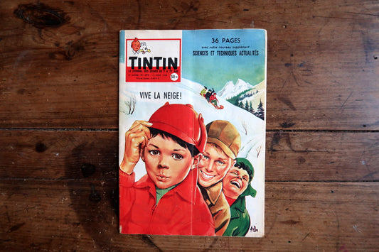 Close-up of the three boys and vertical crease on the Vive la Neige cover