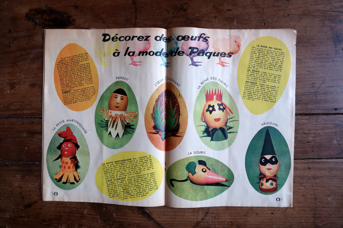 Full Easter cover with red cartoon bird, egg basket, yellow bow, butterfly and tall reeds