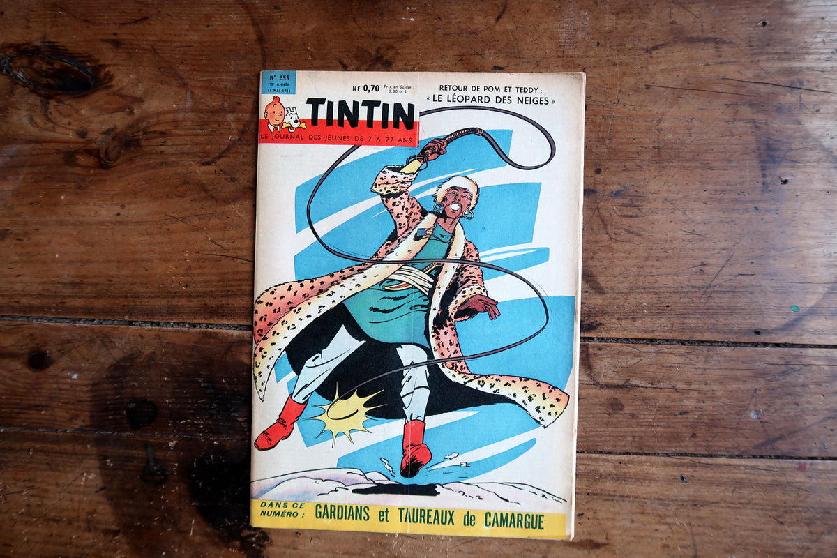 Full Pom et Teddy cover with whip-wielding figure, leopard-patterned coat and red boots