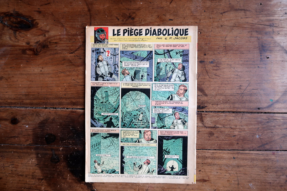 E.P. Jacobs Le Piège Diabolique back-cover episode with Mortimer amid green-toned damaged machinery
