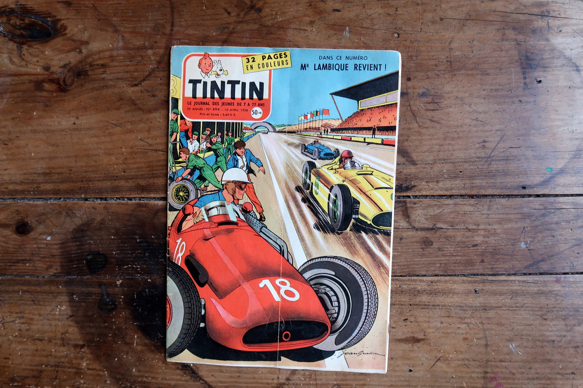 Full racing cover with red car numbered 18, yellow and blue cars and central vertical fold
