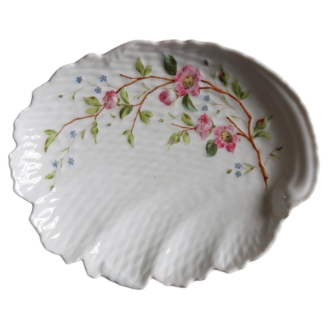 White porcelain shell dish 2C133 with pink blossoms, blue flowers and radiating ribs