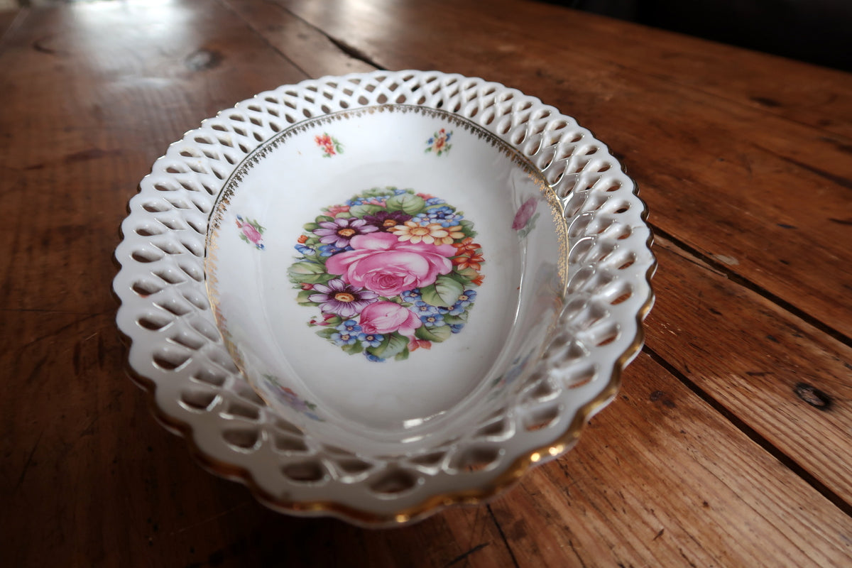 Angled view showing shallow interior and raised lattice border