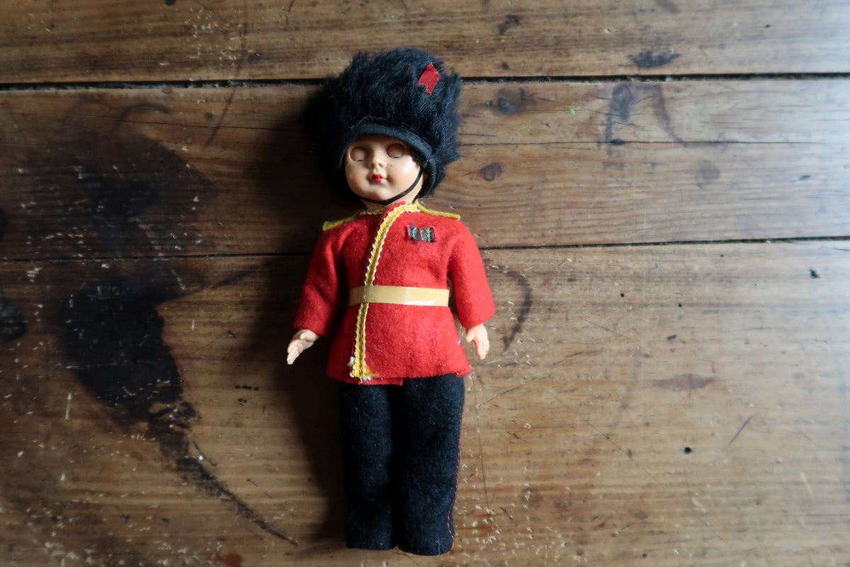 Reclining doll with closed sleepy eyes