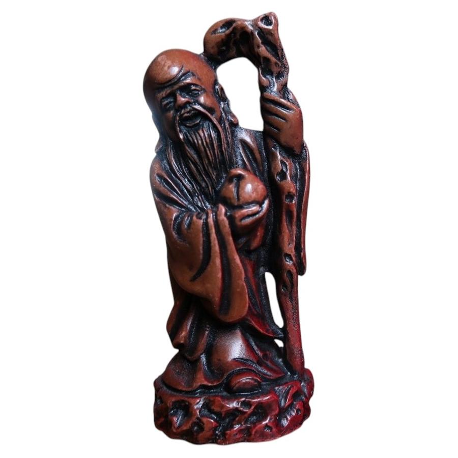 Shoulao resin figurine 2C139 with tall staff, peach and red-brown finish