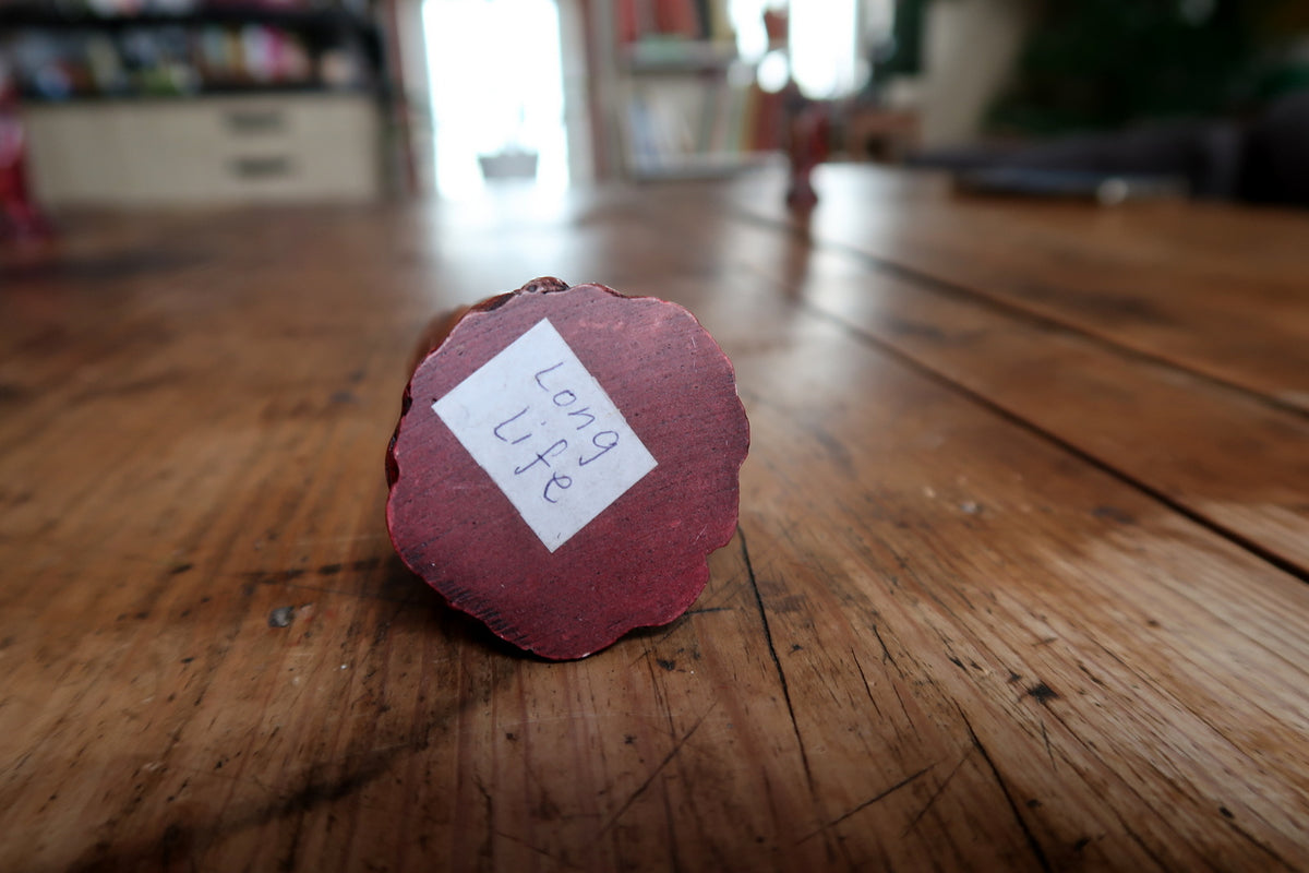 Underside with handwritten Long Life paper label