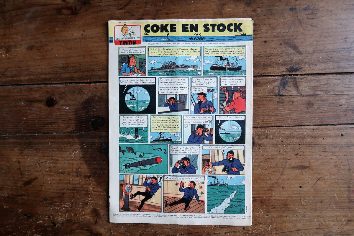 Christmas cover featuring Tintin and companion characters with gifts
