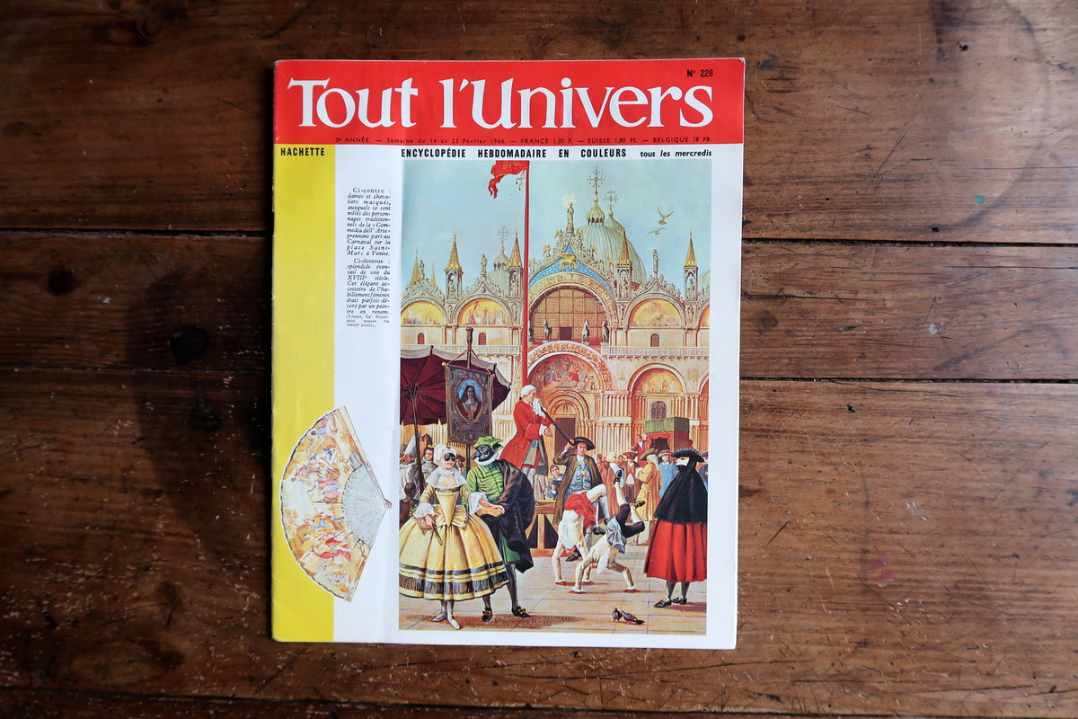 Full front cover showing masked Carnival figures before Saint Mark’s Basilica.