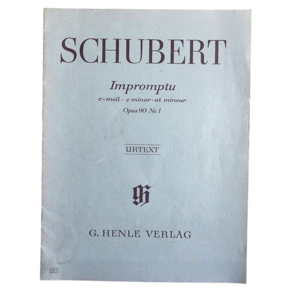Schubert Impromptu Opus 90 No. 1 Henle Urtext score with pale blue-grey paper cover.