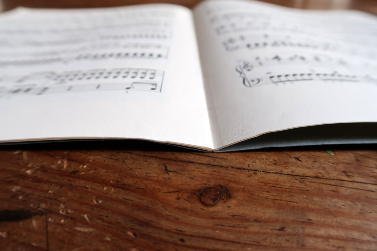 Full front cover identifying the C-minor Impromptu and Henle Urtext edition.