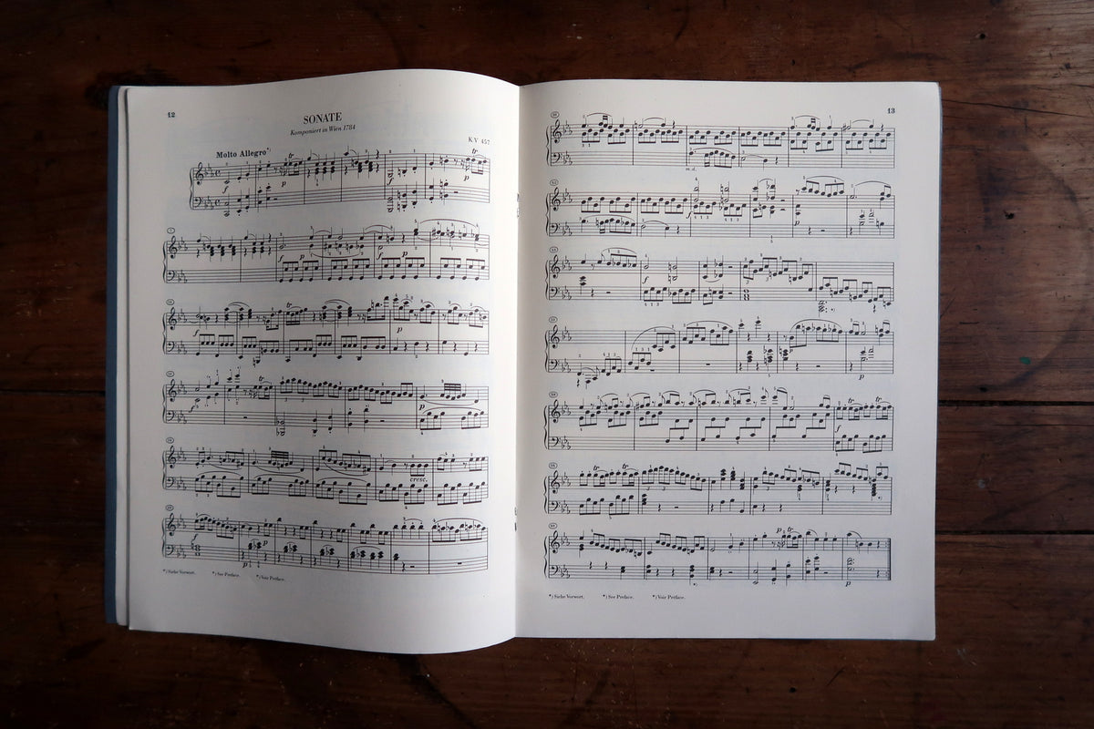 Bilingual German and English preface discussing the Mozart edition.
