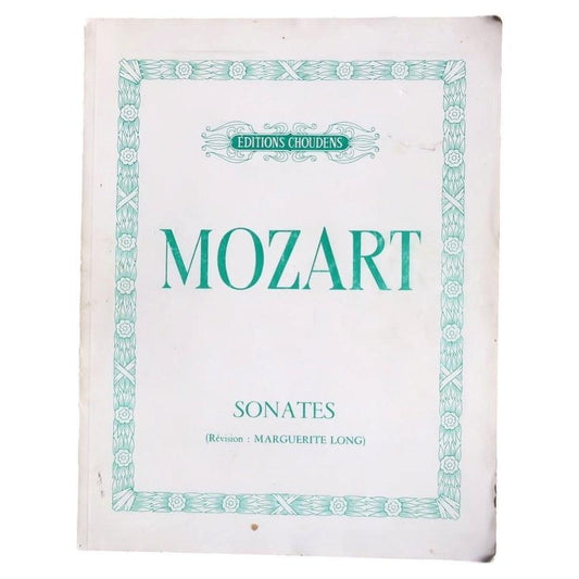 Open Choudens Mozart score showing piano notation and expressive markings across two pages.