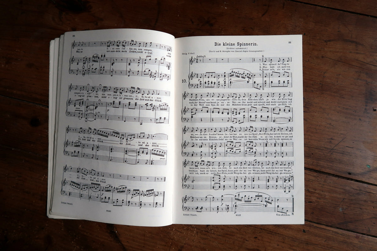 Abendempfindung score spread with German lyrics above piano accompaniment.