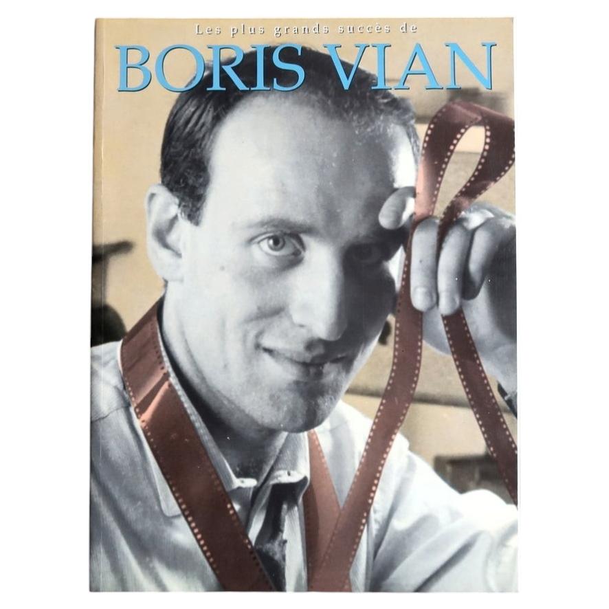 Low-angle Boris Vian songbook cover showing the portrait, filmstrip motif and white page edges.