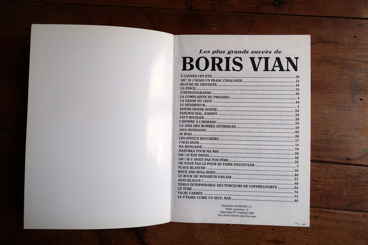 Isolated Boris Vian portrait cover with reddish-brown filmstrip and cream background.