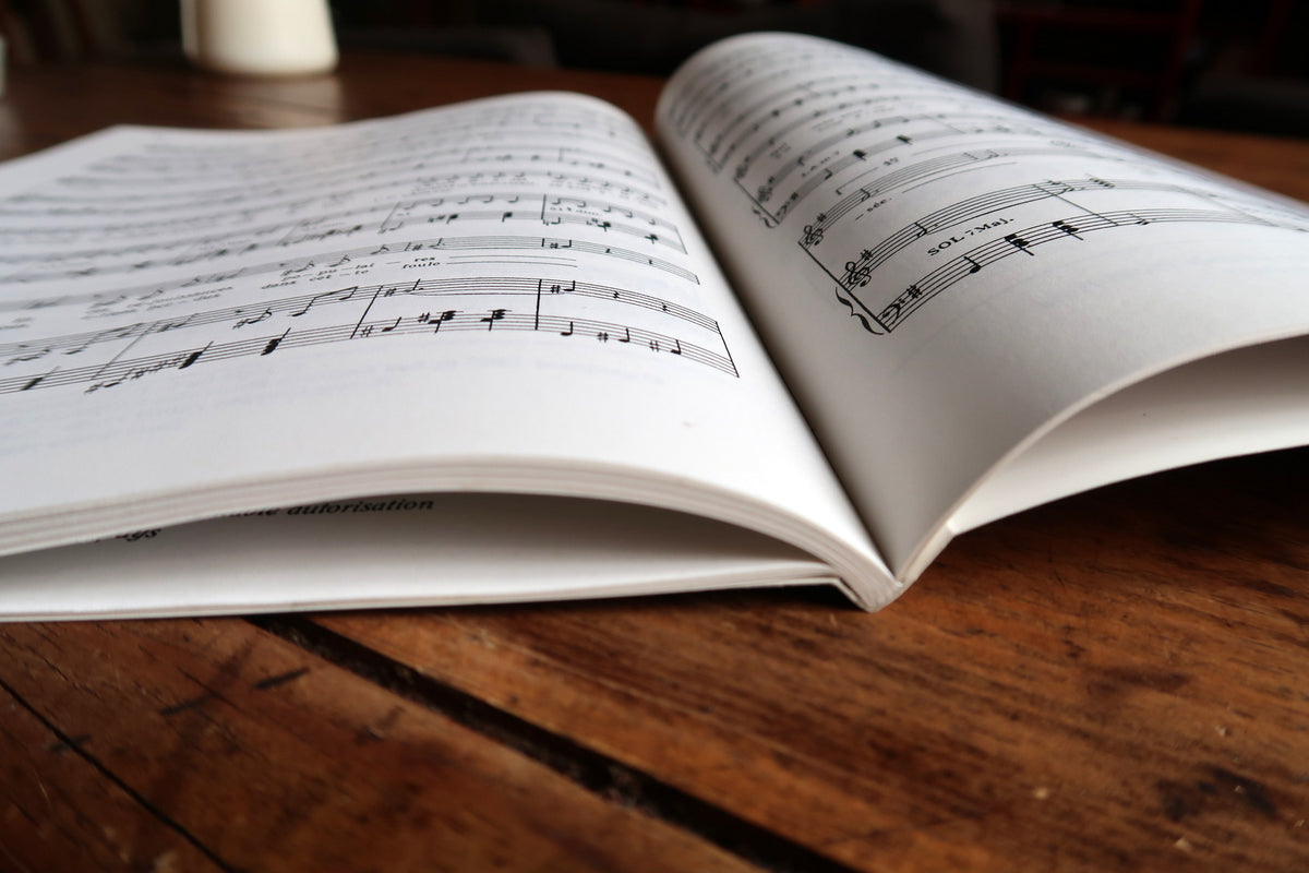Open Boris Vian score showing pages 66 and 67 with voice and piano notation.