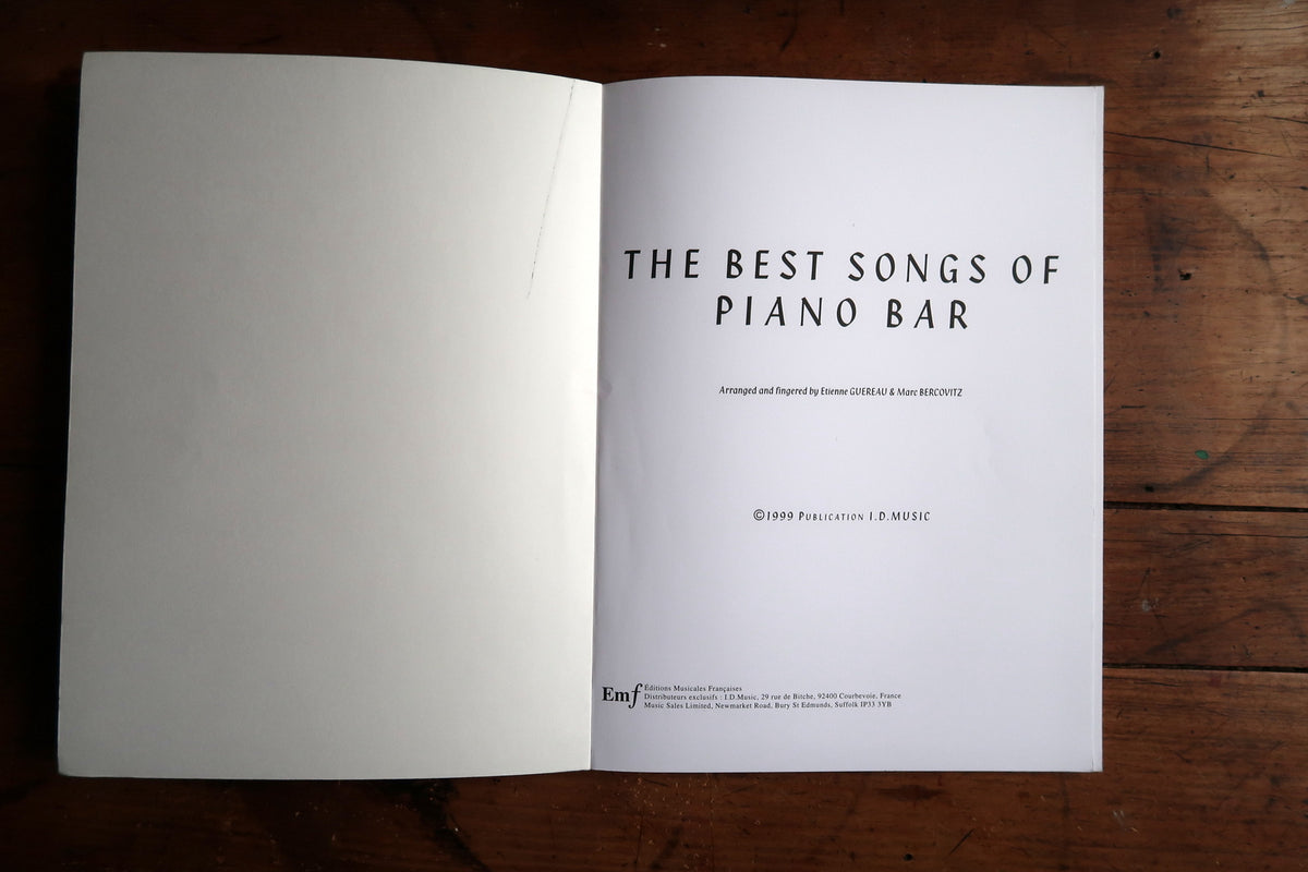 Title page of The Best Songs of Piano Bar with arrangement credits and 1999 I.D. Music copyright.