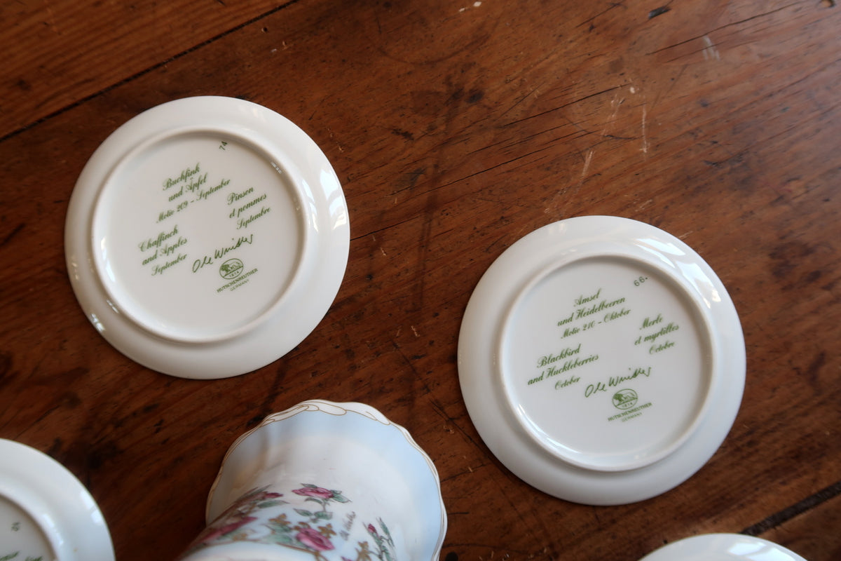 Reverse of two miniature plates showing green Hutschenreuther marks, motif inscriptions and Ole Winther signatures.