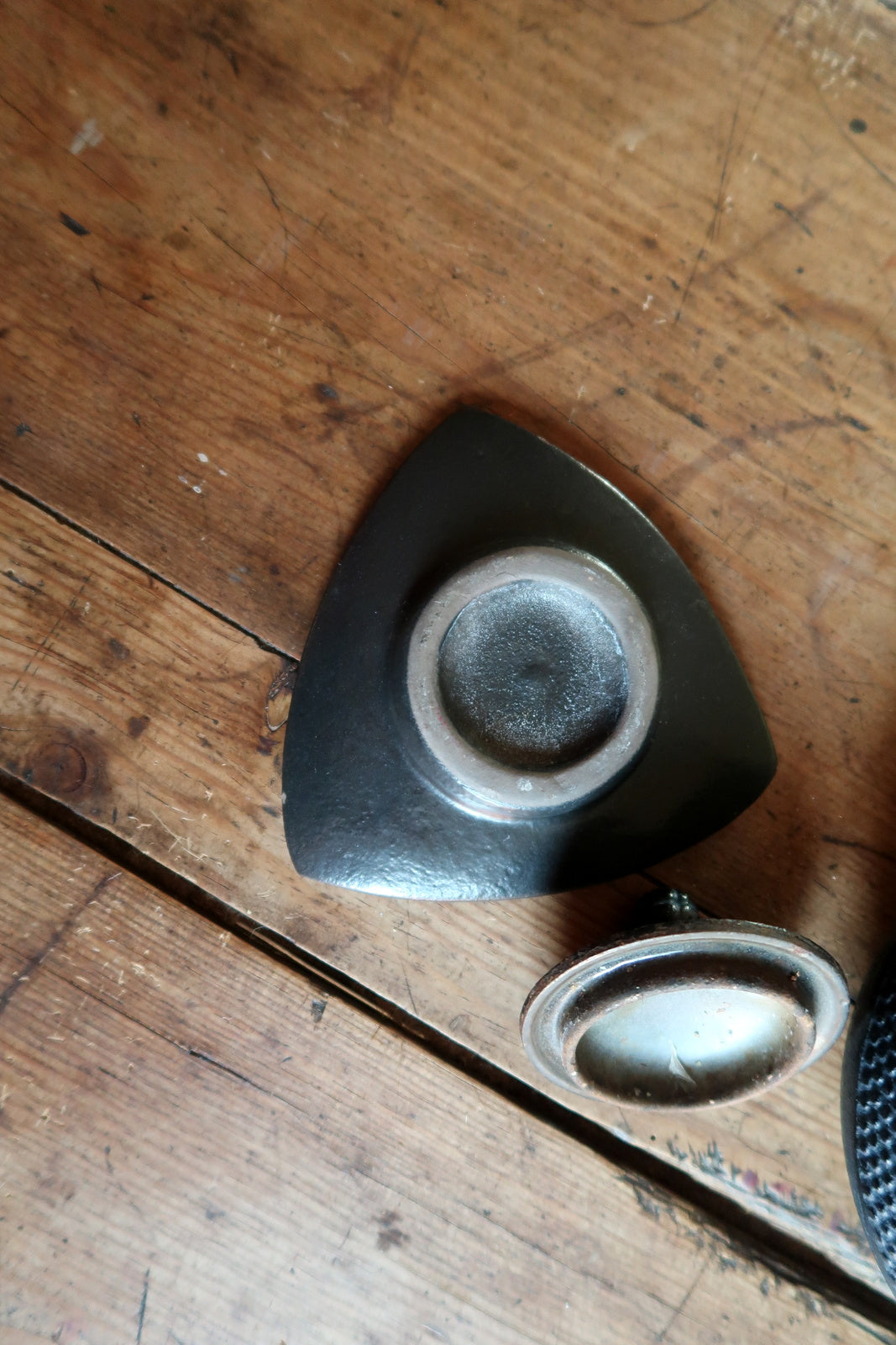 Vintage iron teapot top view, lid and handle in Japanese style design