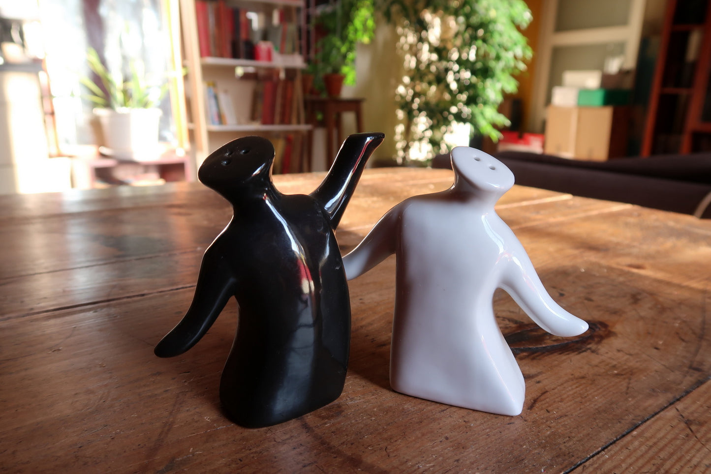 Black and white ceramic salt and pepper shaker set, minimalist anthropomorphic style