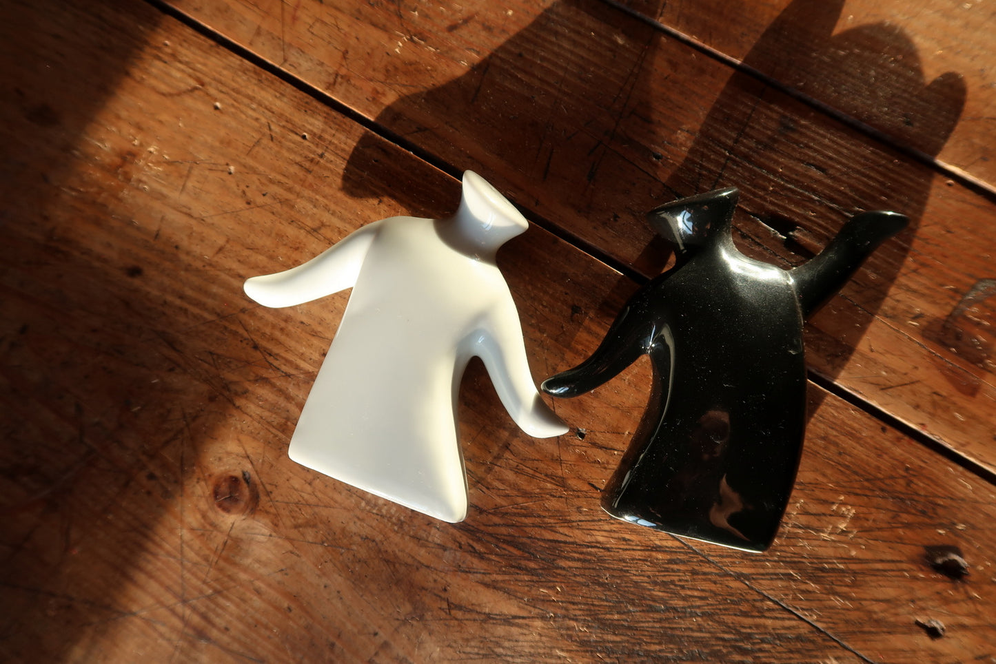 Anthropomorphic shaker set detail, black and white ceramic with playful character