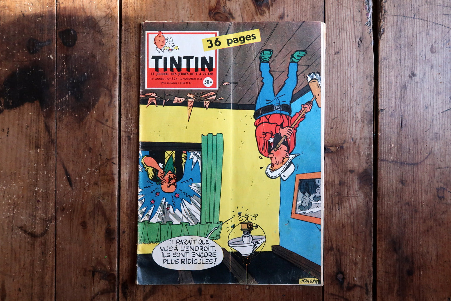 Tintin magazine close-up, showing aged paper texture and vintage print