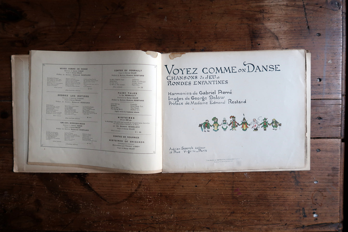 Vintage French music book detail, illustrated pages with songs and sheet music