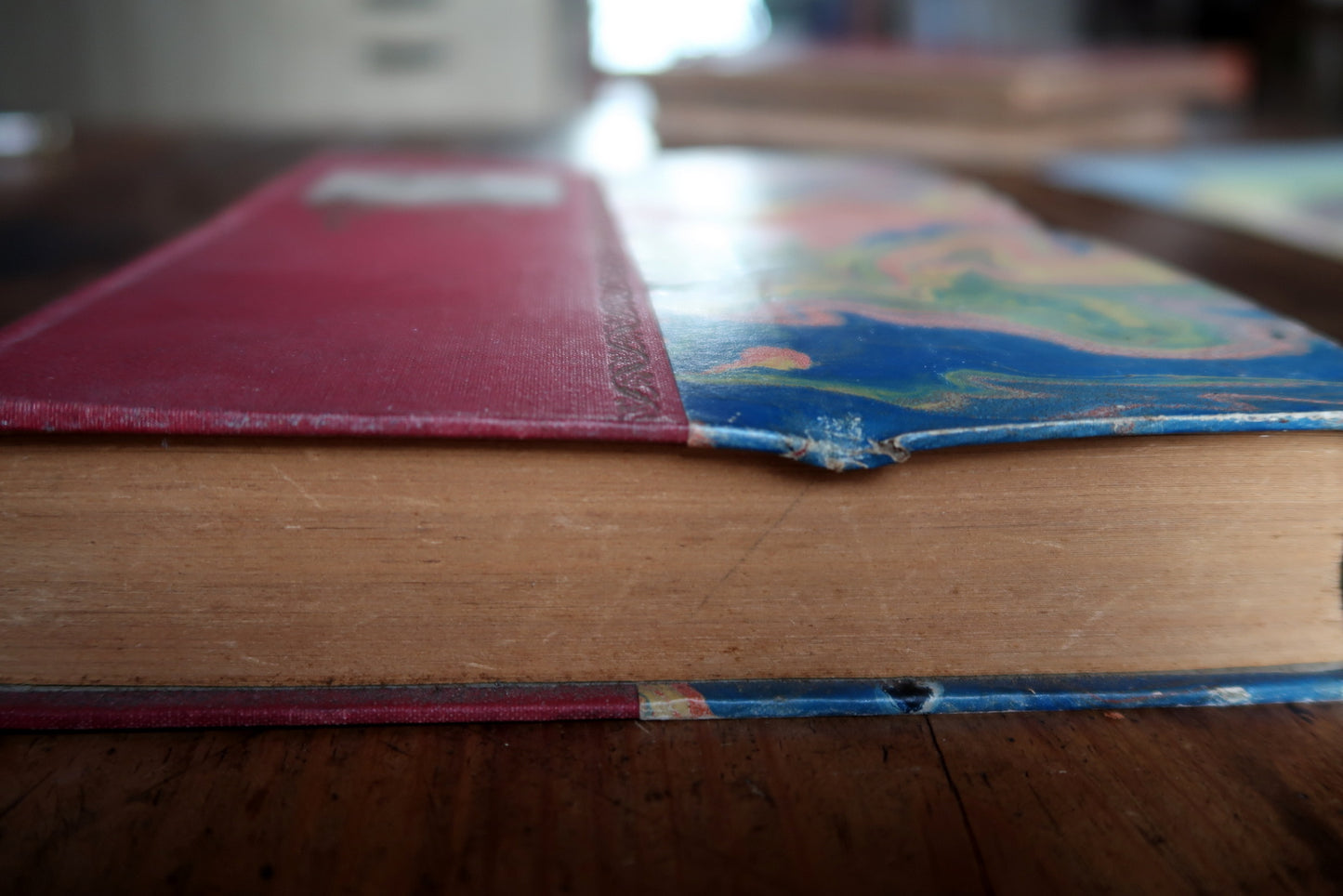 Antique French book spine detail, showing title and binding structure