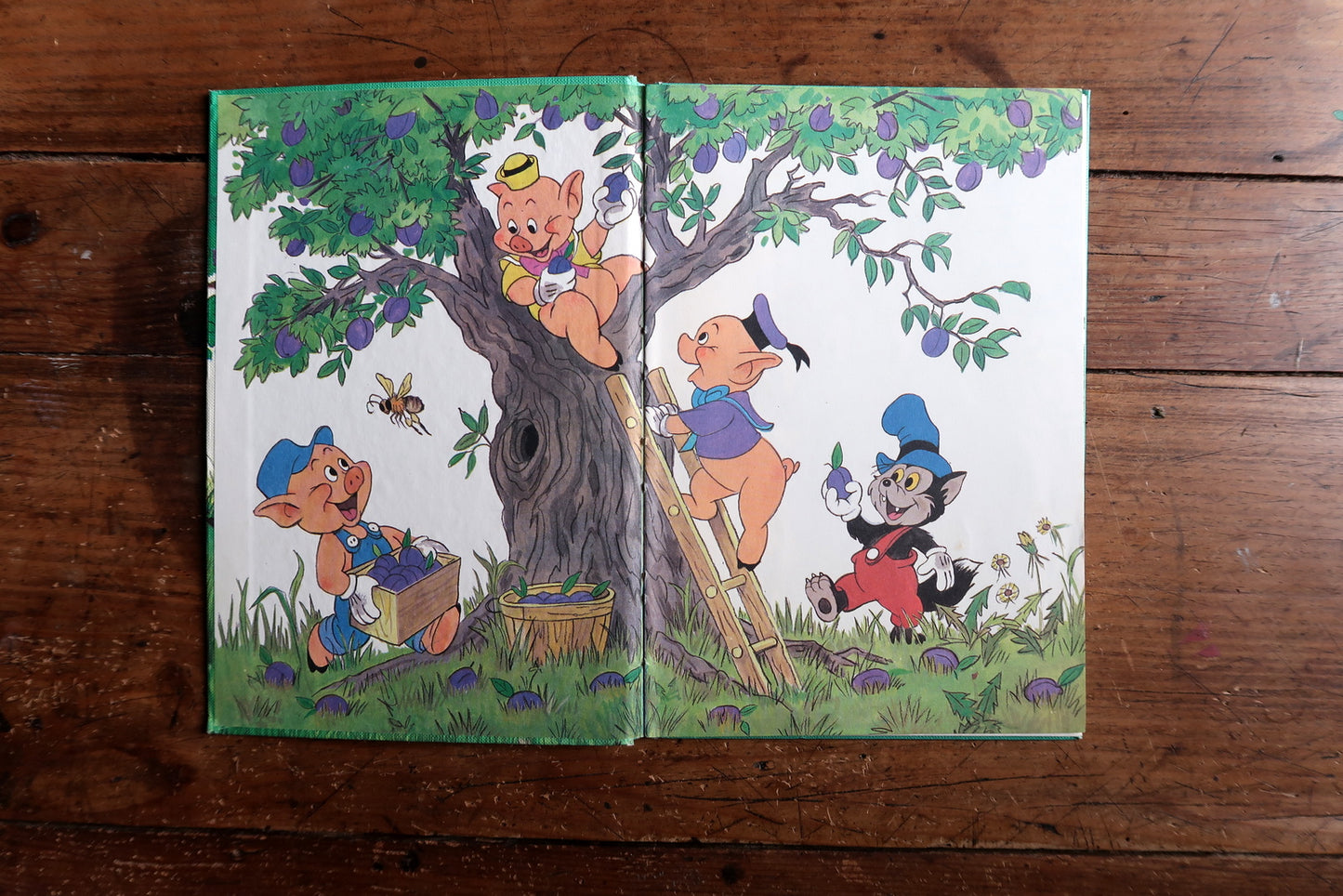 Vintage Disney book detail, vibrant full-color illustrations and characters