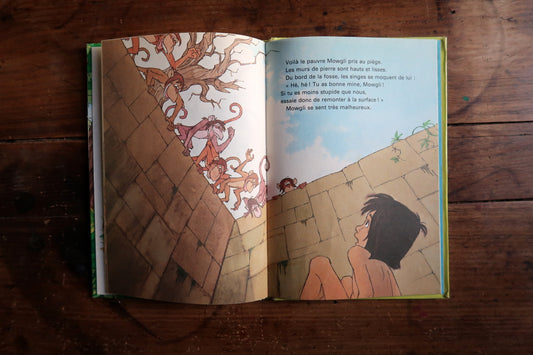 Walt Disney Mowgli book interior pages, illustrated Jungle Book story scenes