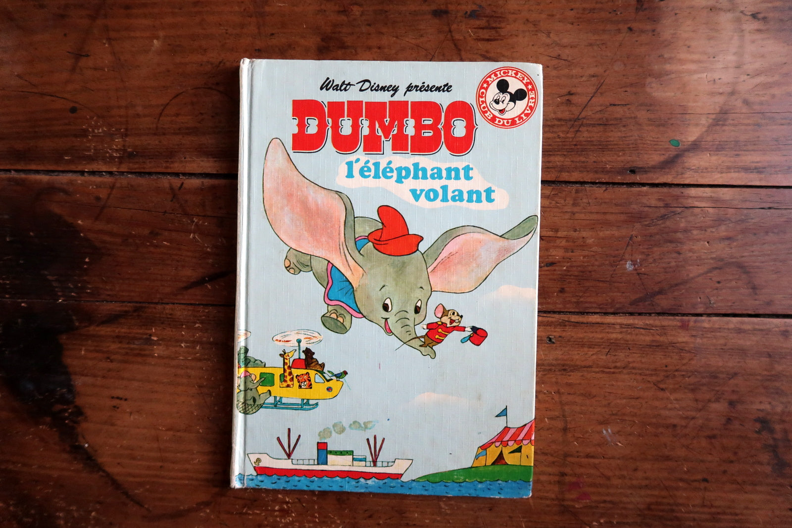 Vintage Disney children’s book close-up, Dumbo illustration with bright colors