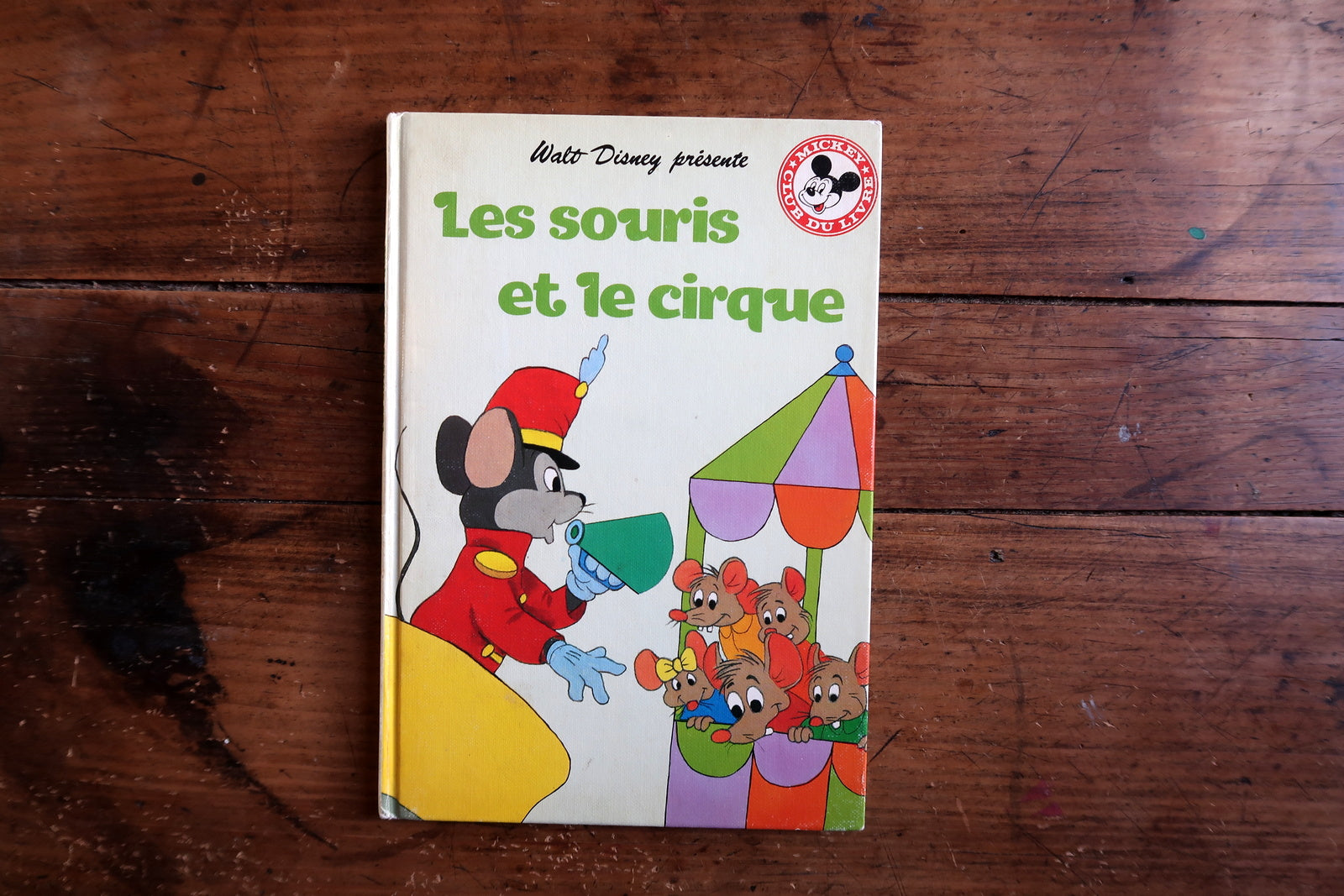 Vintage Disney children’s book close-up, mice characters in circus scene