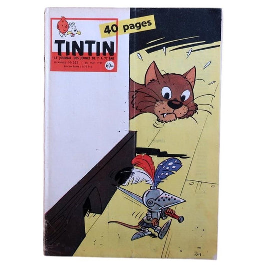 Vintage Tintin magazine No. 553 from May 1959, French comic journal from the Hergé era, featuring a playful cover of an armored character confronted by a cat in bold mid-century graphic style.

