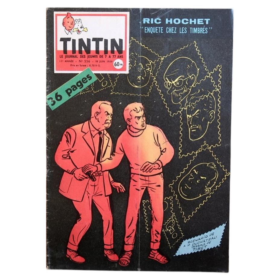 Vintage Tintin magazine No. 556 from June 1959, French comic journal featuring a noir-style Ric Hochet cover with bold black and red tones and stylized postage stamp portraits.

