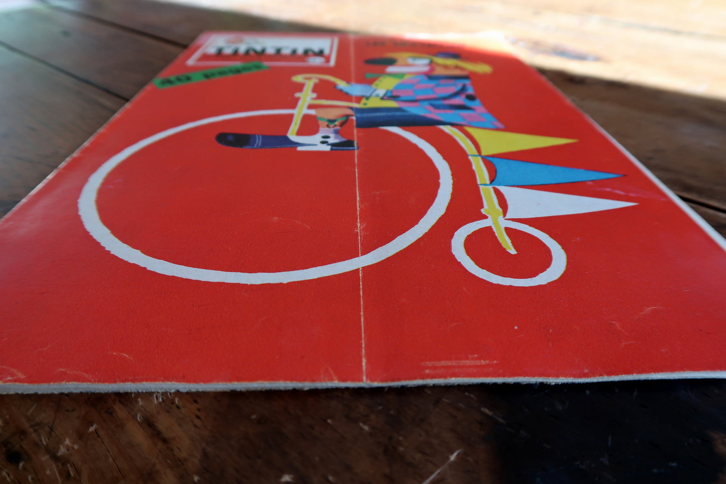 Vintage illustrated comic journal from July 1959, featuring a bold red background and stylized penny-farthing-riding clown, referencing the famous Fratellini circus family.

