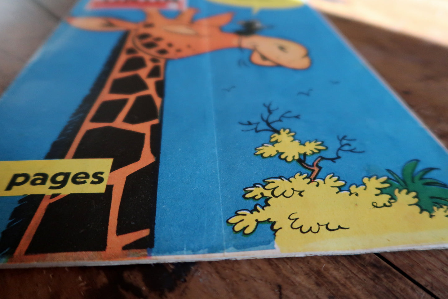 Back cover and spine detail of a 1959 Tintin comic magazine in good vintage condition with light wear, minor creases, and slight paper yellowing.

