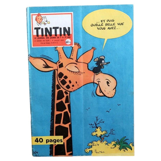 Front cover of vintage Tintin magazine No. 559 from July 1959 featuring a colorful illustration of a giraffe and a small character with the iconic Tintin header.

