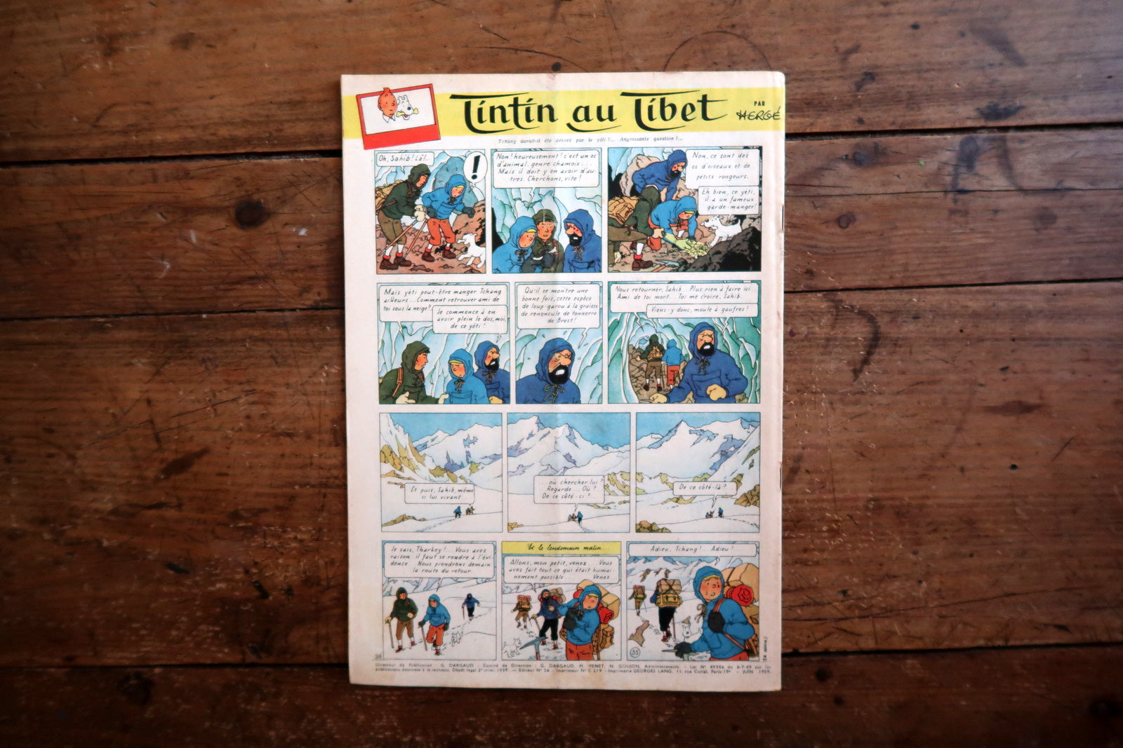 Collectible 1959 Tintin magazine from the golden era of European comics, featuring a racing-themed cover and interior pages from Tintin au Tibet by Hergé.

