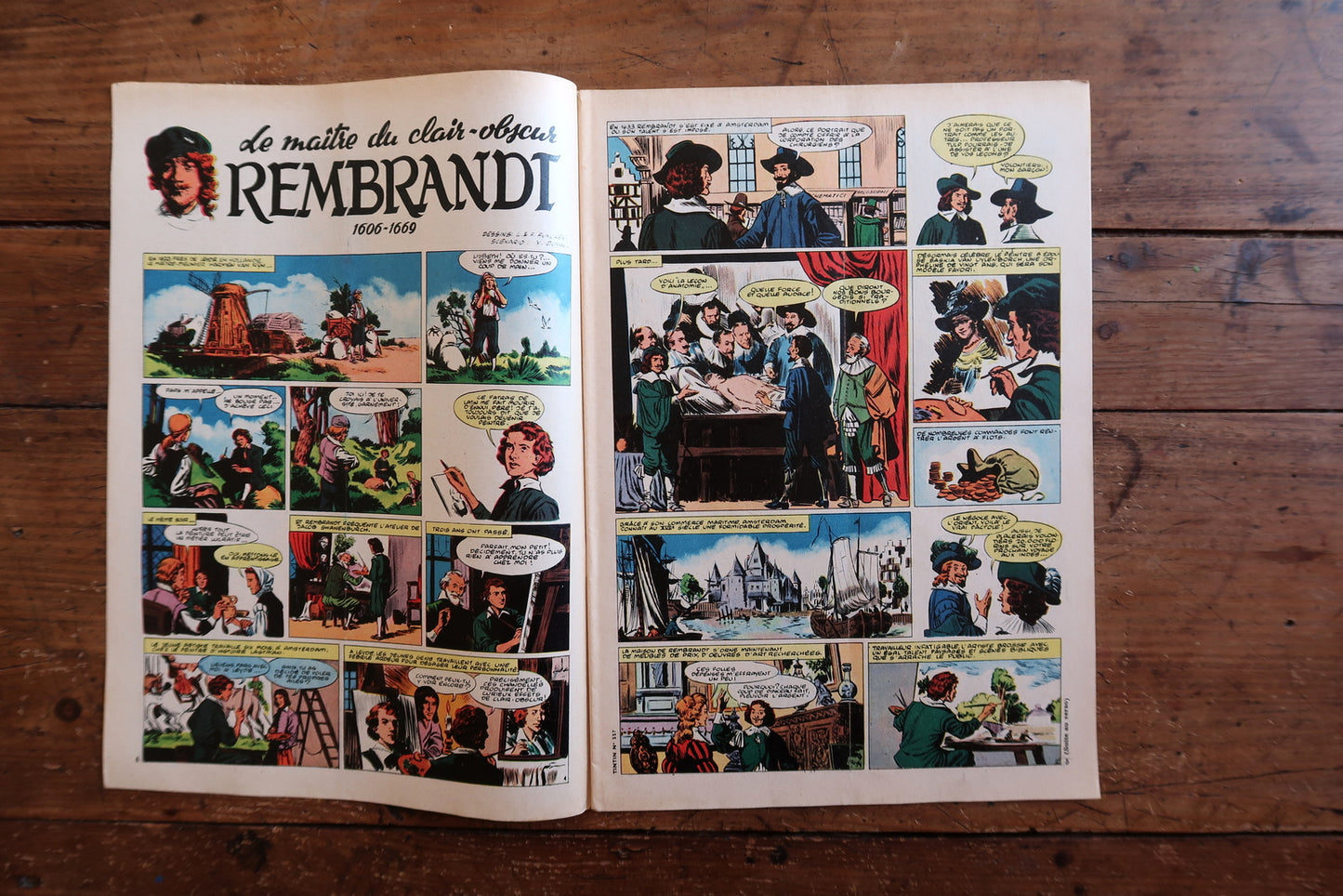 Open view of vintage Tintin magazine No. 557 showing interior comic strips, historical features including Rembrandt, and period advertisements from the late 1950s.

