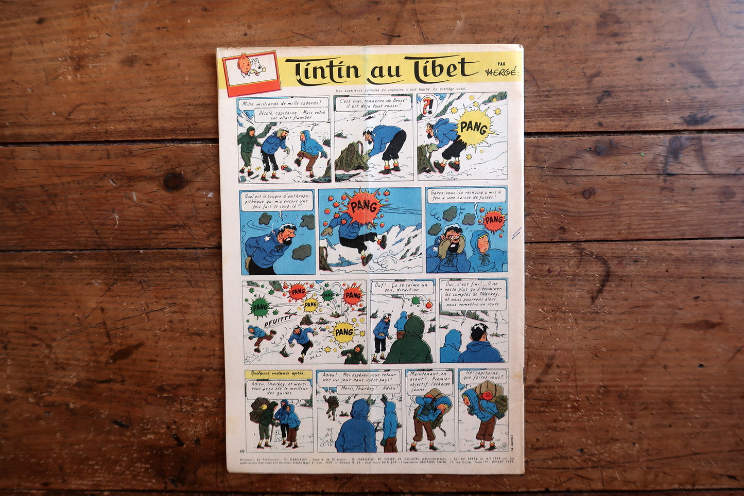 Collectible 1959 Tintin magazine from the golden era of European comics, featuring an Oumpah-Pah cover and interior pages from Tintin au Tibet by Hergé.

