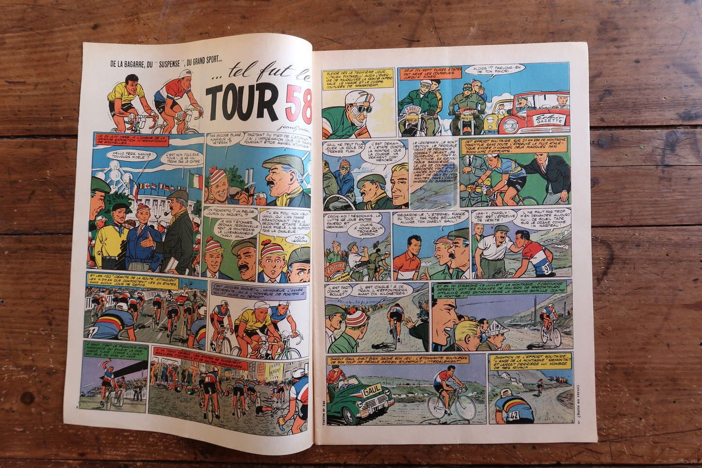 Open view of vintage Tintin magazine No. 560 showing interior comic strips including Modeste et Pompon, adventure stories, and period articles from mid-century culture.

